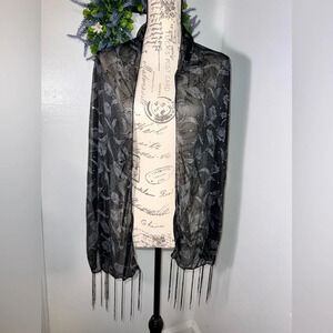 Rectangular black floral sequent accented fringed sheer art to wear‎ scarf.